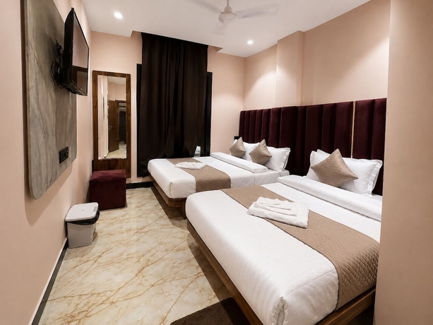 Imagen de la habitación del Hotel Old City Inn, Ujjain. Foto 6