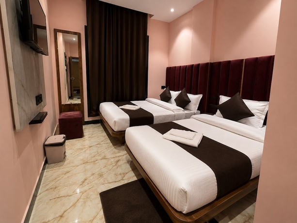 Imagen de la habitación del Hotel Old City Inn, Ujjain. Foto 8