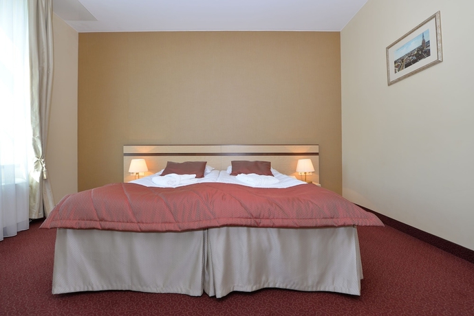 Imagen de la habitación del Hotel Old Mill Comfort. Foto 5