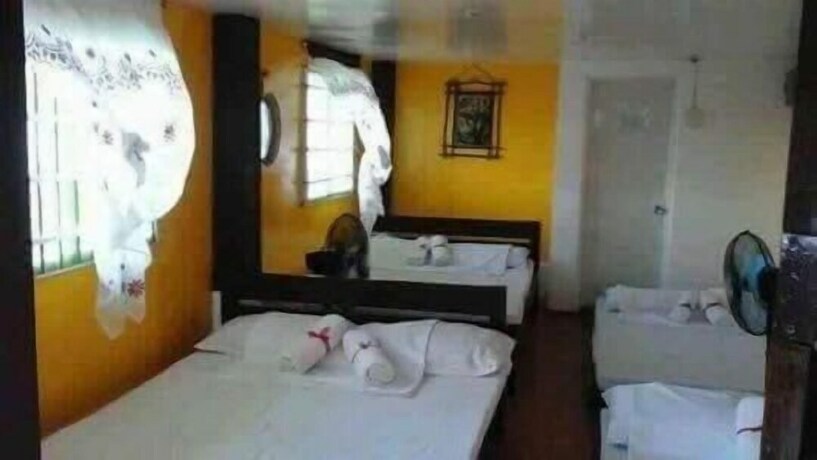 Imagen de la habitación del Hotel Old Parola Seaside Cottages. Foto 12