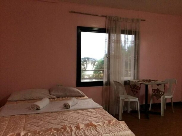 Imagen de la habitación del Hotel Old Parola Seaside Cottages. Foto 17