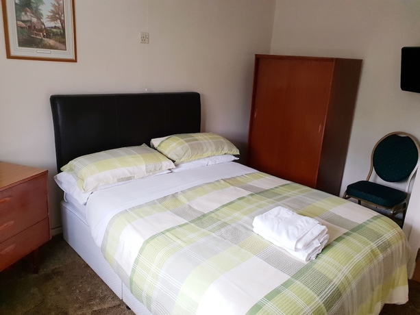 Imagen de la habitación del Hotel Old Priory Guest House. Foto 11