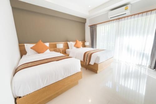 Imagen de la habitación del Hotel Old Town Chiangmai Boutique. Foto 10