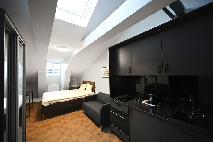 Imagen de la habitación del Hotel Old Town Stay. Foto 15