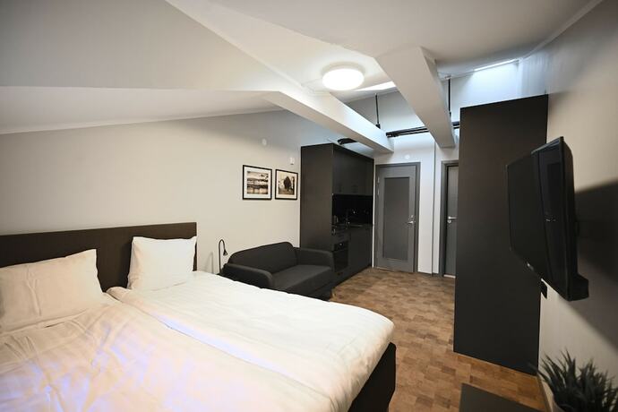 Imagen de la habitación del Hotel Old Town Stay. Foto 19