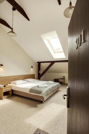 Imagen de la habitación del Hotel Old Town Trio. Foto 10