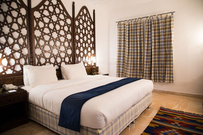 Imagen de la habitación del Hotel Old Village Resort. Foto 16