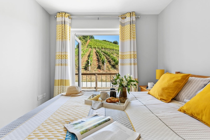 Imagen de la habitación del Hotel Old Walls Vineyard. Foto 10