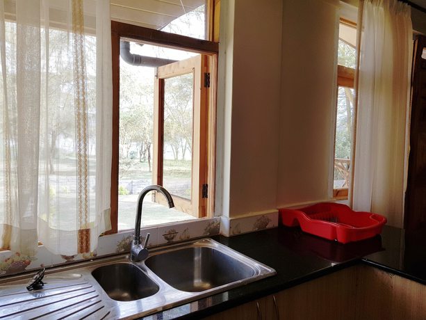 Imagen de la habitación del Hotel Ole Itiko Cottages. Foto 4