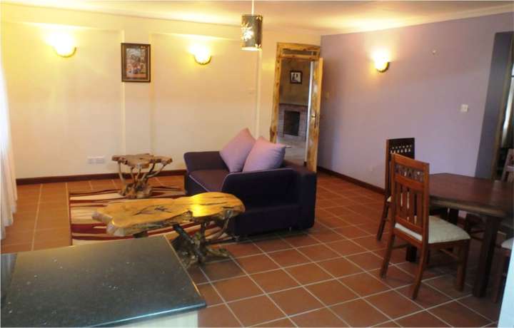 Imagen de la habitación del Hotel Ole Itiko Cottages. Foto 12