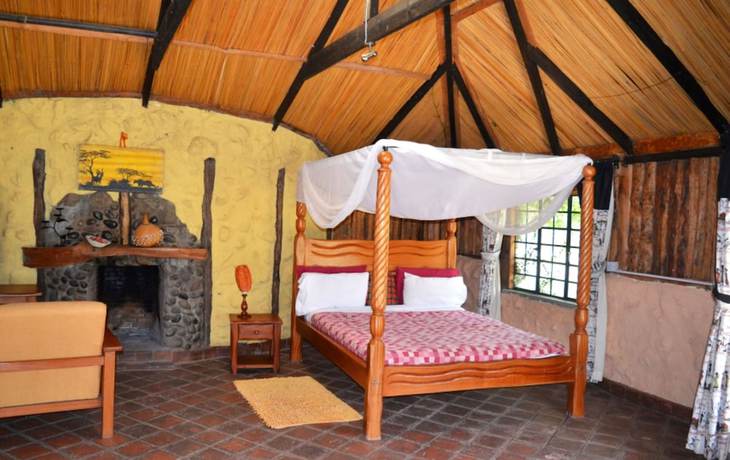 Imagen de la habitación del Hotel Ole Itiko Cottages. Foto 18
