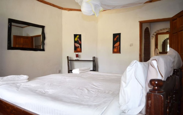 Imagen de la habitación del Hotel Ole Itiko Cottages. Foto 19
