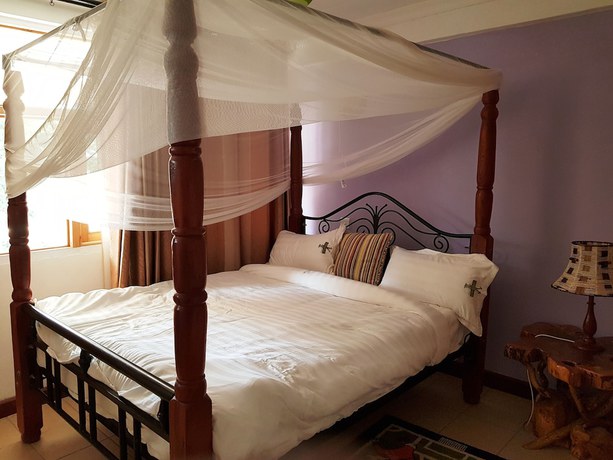 Imagen de la habitación del Hotel Ole Itiko Cottages. Foto 20