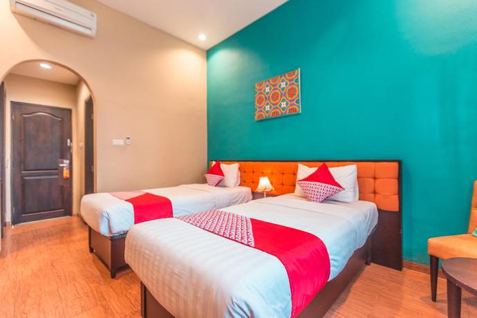 Imagen de la habitación del Hotel Ole Suites Hotel. Foto 10