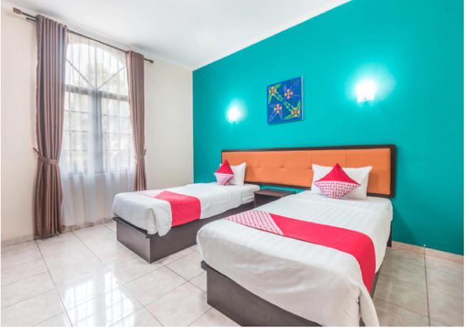 Imagen de la habitación del Hotel Ole Suites Hotel. Foto 13