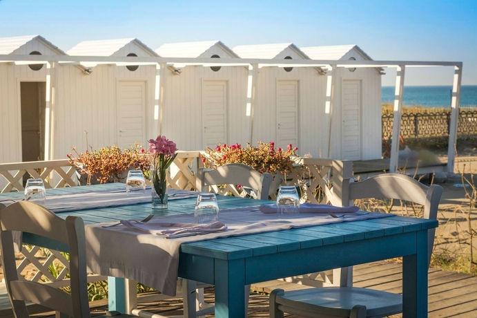 Imagen del bar/restaurante del Hotel Oleandri Resort. Foto 6