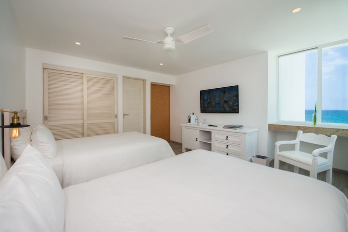 Imagen de la habitación del Hotel Oleo Cancun Playa All Inclusive Resort, Cancún. Foto 12