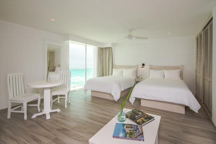Imagen de la habitación del Hotel Oleo Cancun Playa All Inclusive Resort. Foto 5