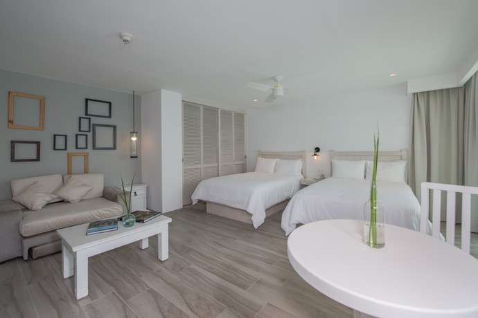Imagen de la habitación del Hotel Oleo Cancun Playa All Inclusive Resort. Foto 6
