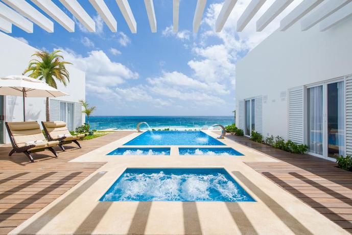 Imagen de la piscina del Hotel Oleo Cancun Playa All Inclusive Resort. Foto 10