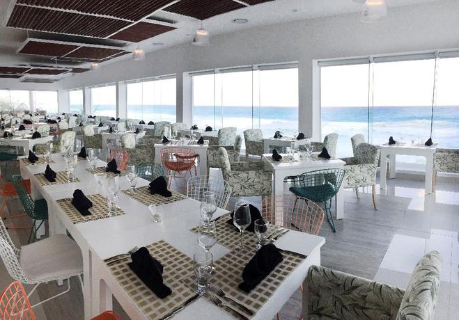 Imagen del bar/restaurante del Hotel Oleo Cancun Playa All Inclusive Resort. Foto 4