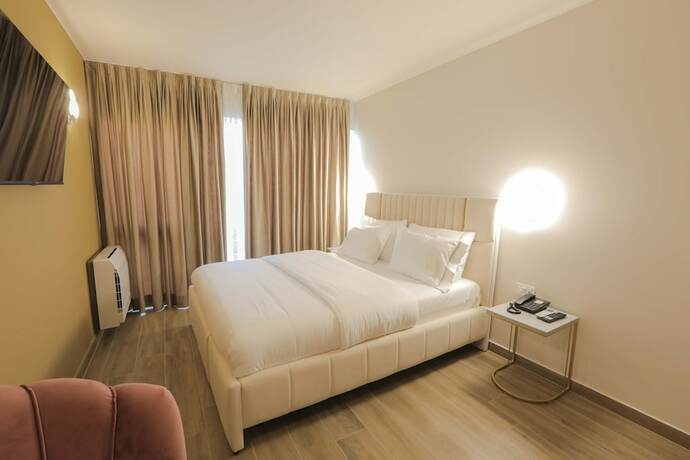Imagen de la habitación del Hotel Olia Residence. Foto 16