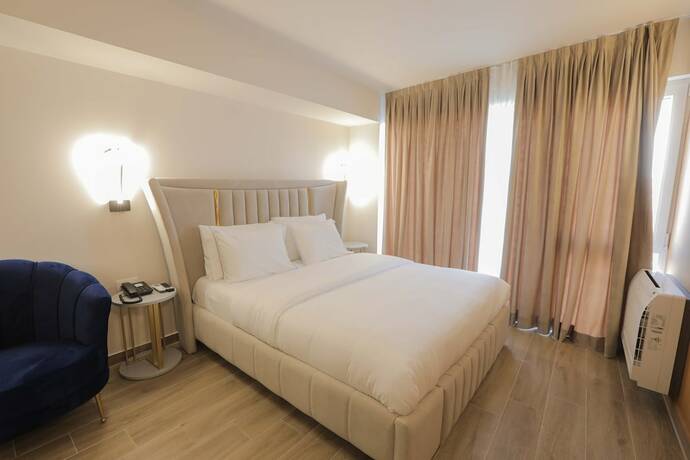 Imagen de la habitación del Hotel Olia Residence. Foto 17