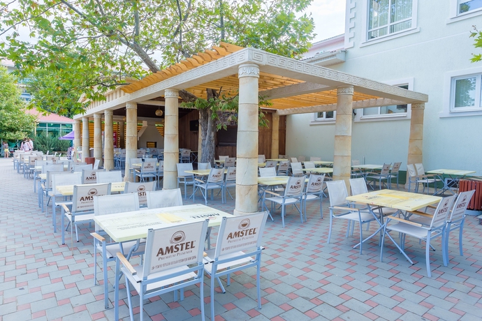 Imagen del bar/restaurante del Hotel Olimp Resort All Inclusive. Foto 4