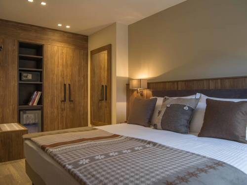 Imagen de la habitación del Hotel Olimpia, Bormio. Foto 2