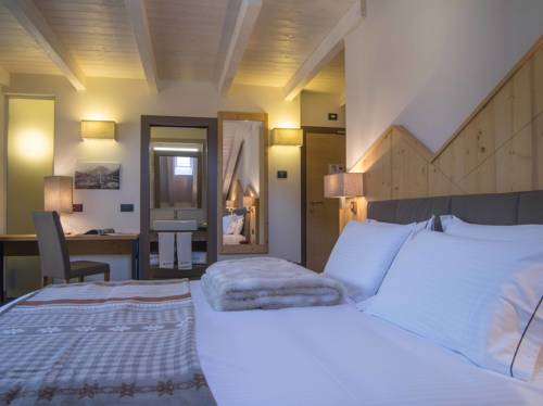 Imagen de la habitación del Hotel Olimpia, Bormio. Foto 3