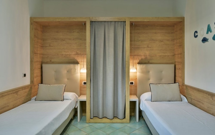 Imagen de la habitación del Hotel Olimpia Cilento Resort. Foto 6