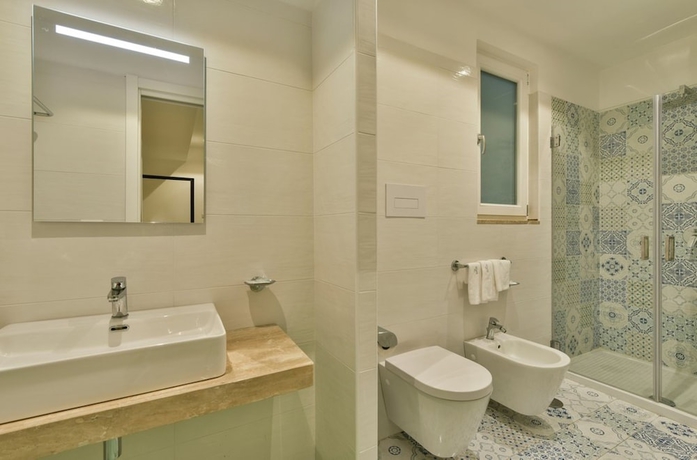 Imagen de la habitación del Hotel Olimpia Cilento Resort. Foto 9