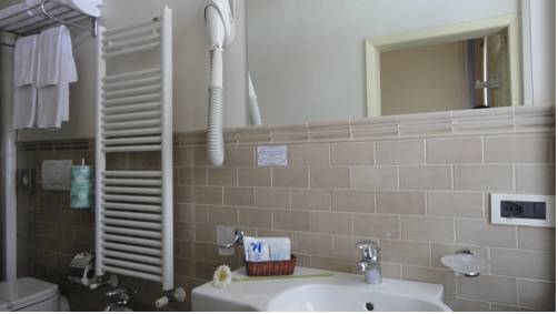 Imagen de la habitación del Hotel Olimpia, Forte de Marmi. Foto 3