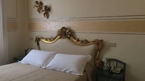 Imagen de la habitación del Hotel Olimpia, Forte de Marmi. Foto 5