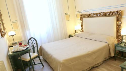 Imagen de la habitación del Hotel Olimpia, Forte de Marmi. Foto 6