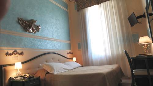 Imagen de la habitación del Hotel Olimpia, Forte de Marmi. Foto 7
