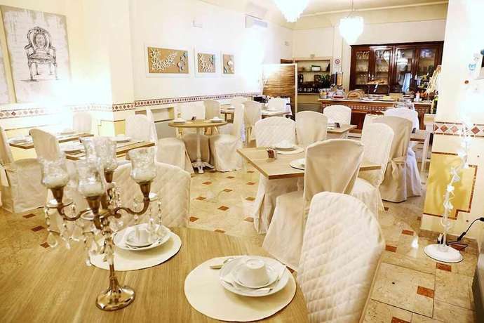 Imagen del bar/restaurante del Hotel Olimpia, Forte de Marmi. Foto 4