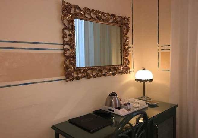 Imagen de la habitación del Hotel Olimpia, Forte de Marmi. Foto 11