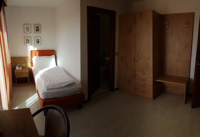 Imagen de la habitación del Hotel Olimpic, Baselga di Pine. Foto 5