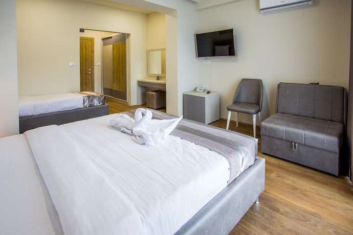 Imagen de la habitación del Hotel Olimpija Plus. Foto 18