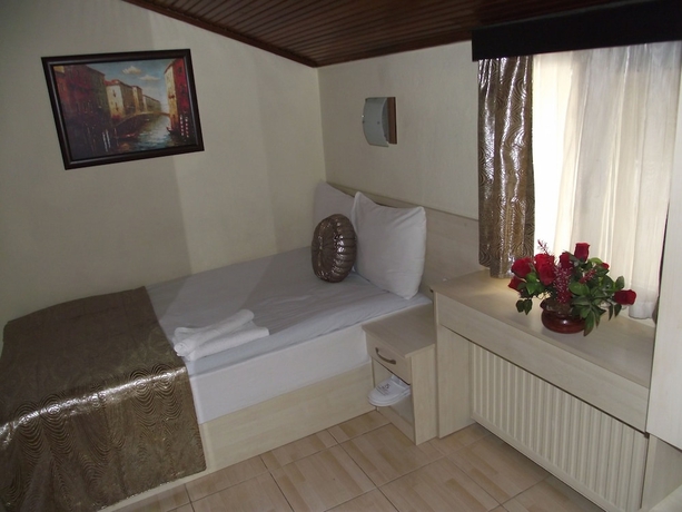 Imagen de la habitación del Hotel Olimpiyat Otel Izmir. Foto 3