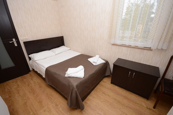 Imagen de la habitación del Hotel Olimpo Guest House. Foto 5