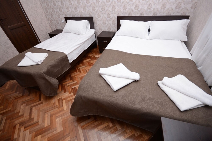 Imagen de la habitación del Hotel Olimpo Guest House. Foto 7
