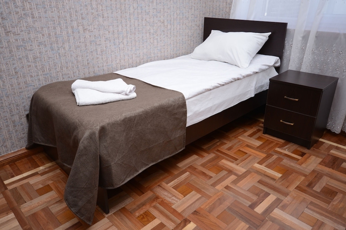 Imagen de la habitación del Hotel Olimpo Guest House. Foto 11