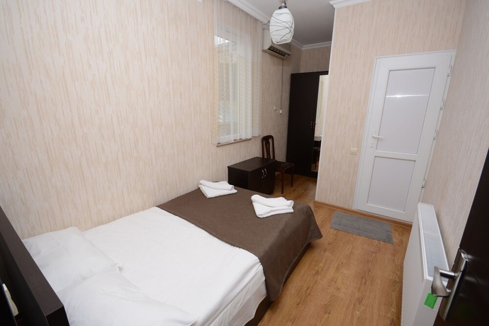 Imagen de la habitación del Hotel Olimpo Guest House. Foto 13