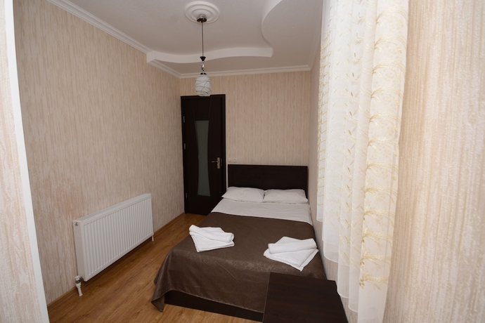 Imagen de la habitación del Hotel Olimpo Guest House. Foto 14