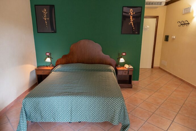 Imagen de la habitación del Hotel Olimpo Sila. Foto 14