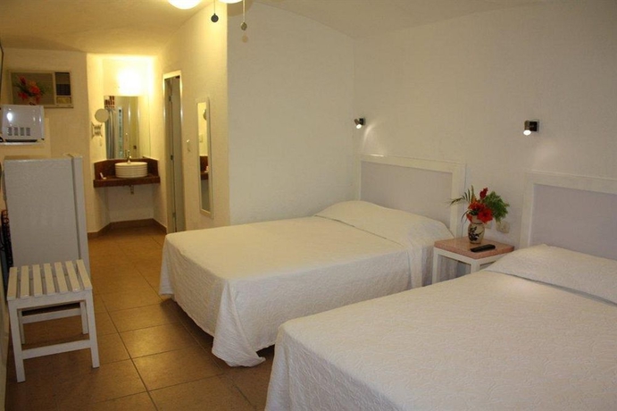 Imagen de la habitación del Hotel Olinalá Diamante. Foto 8