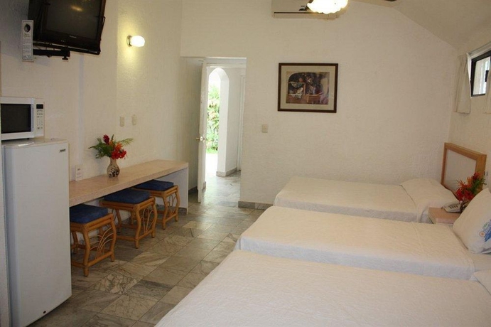 Imagen de la habitación del Hotel Olinalá Diamante. Foto 10