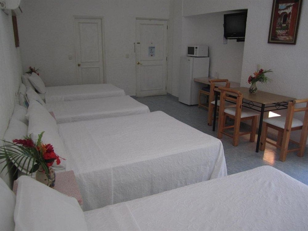 Imagen de la habitación del Hotel Olinalá Diamante. Foto 11